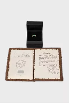 Gold ring with diamonds and emerald