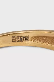 Gold ring with diamonds and emerald