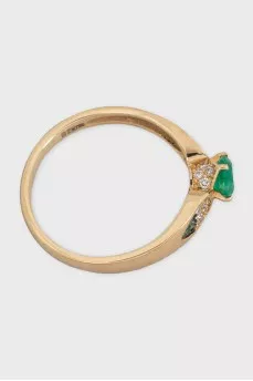 Gold ring with diamonds and emerald