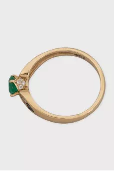 Gold ring with diamonds and emerald