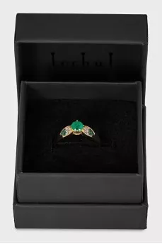 Gold ring with diamonds and emerald