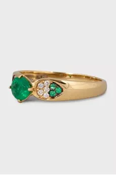 Gold ring with diamonds and emerald