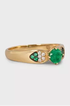 Gold ring with diamonds and emerald