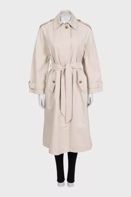 Beige trench coat with a buttoned belt