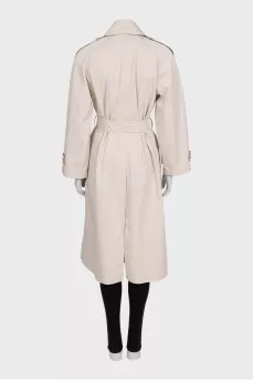 Beige trench coat with a buttoned belt