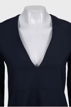 Fitted wool dress decorated with lace