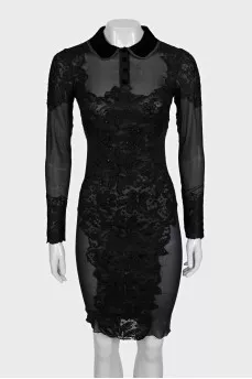 A transparent black dress decorated with lace