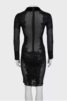 A transparent black dress decorated with lace