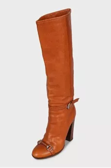 brown leather boots with buckles