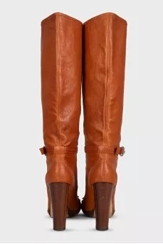 brown leather boots with buckles