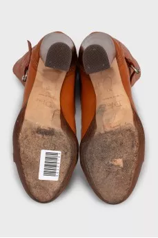 brown leather boots with buckles