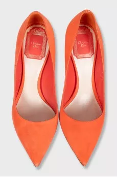 Orange suede pumps