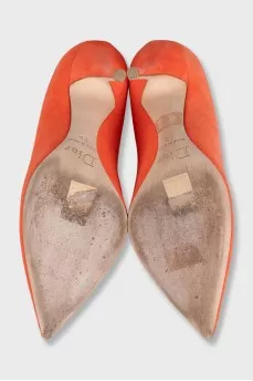 Orange suede pumps