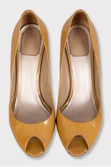 Yellow patent leather high heels