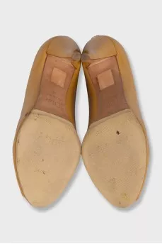 Yellow patent leather high heels