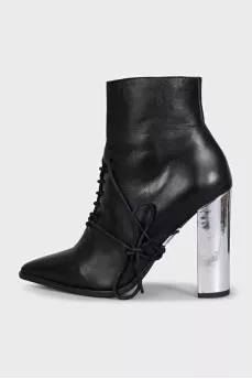 Black leather ankle boots with a pointed toe