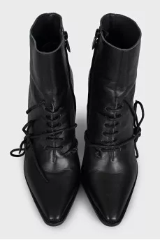 Black leather ankle boots with a pointed toe
