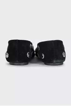 Black suede ballet flats with pointed toe and metallic embellishments