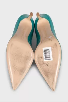 Green leather pumps