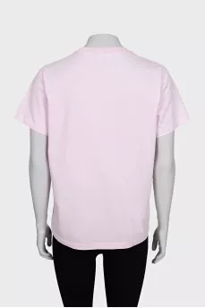 Pink straight-cut t-shirt with a print