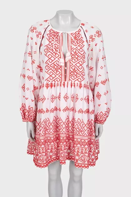 White mini dress with red embroidery and long sleeves