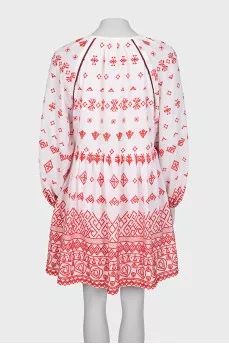 White mini dress with red embroidery and long sleeves
