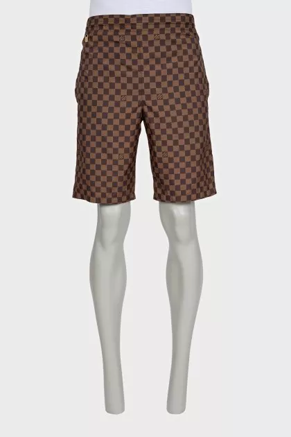 Men's brown shorts with a signature print