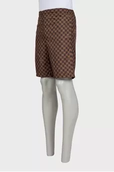 Men's brown shorts with a signature print