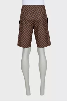 Men's brown shorts with a signature print