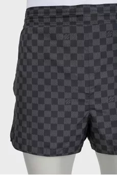Men's gray shorts with a signature print