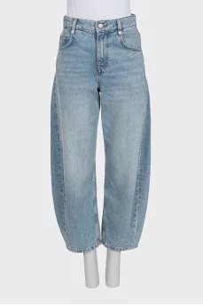 Tapered distressed jeans with tag