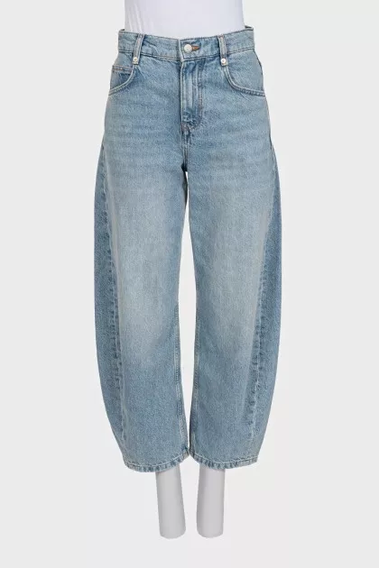 Tapered distressed jeans with tag