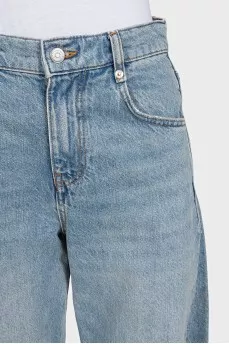 Tapered distressed jeans with tag