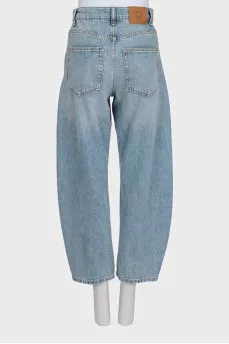 Tapered distressed jeans with tag