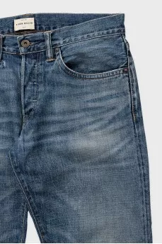 Men's blue skinny jeans with a distressed effect