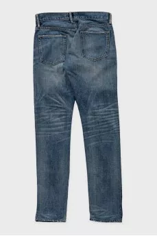 Men's blue skinny jeans with a distressed effect