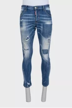 Men's blue jeans with a distressed effect