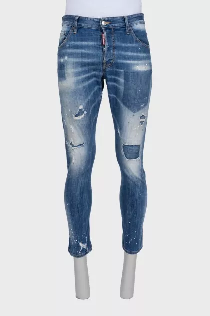 Men's blue jeans with a distressed effect