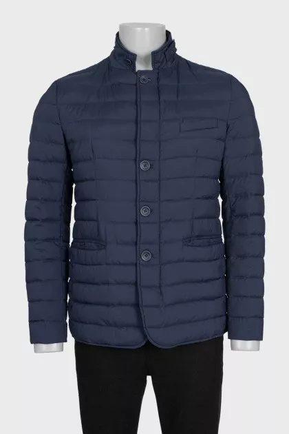 Dark blue men's quilted jacket with pockets