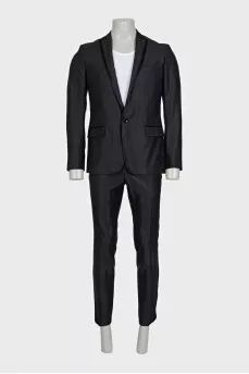 Men's suit consisting of a jacket and trousers with stripes