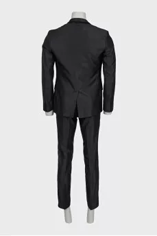 Men's suit consisting of a jacket and trousers with stripes