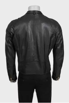 Men's leather jacket decorated with perforations
