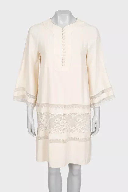 Beige dress with lace inserts