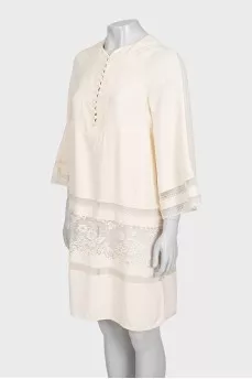 Beige dress with lace inserts