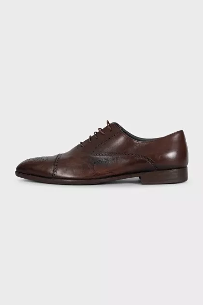 Men's leather lace-up shoes with perforations