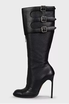 High leather boots with stiletto heels and a zipper