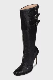 High leather boots with stiletto heels and a zipper