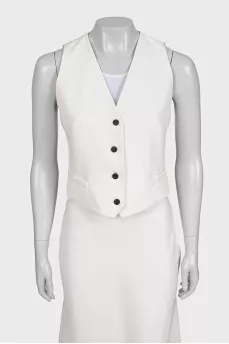 White suit with a skirt, jacket and vest