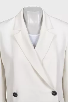 White suit with a skirt, jacket and vest