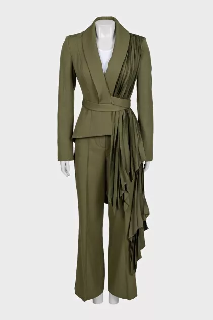 Suit of trousers with stripes and asymmetrical jacket